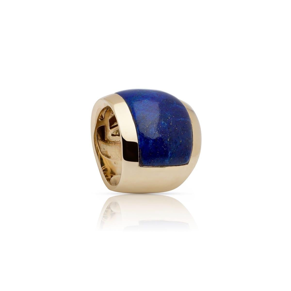 The natural intense blue lapis lazuli with tiny gold flecks of pyrite evenly distributed  are set in a contemporary 18 Karat yellow gold ring. 
Known as the Wisdom Stone, Lapis Lazuli encourages enlightment, self -confidence, peace and