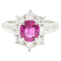 Contemporary 1.89 Carats Oval Cut Ruby Diamond Platinum Cluster Ring