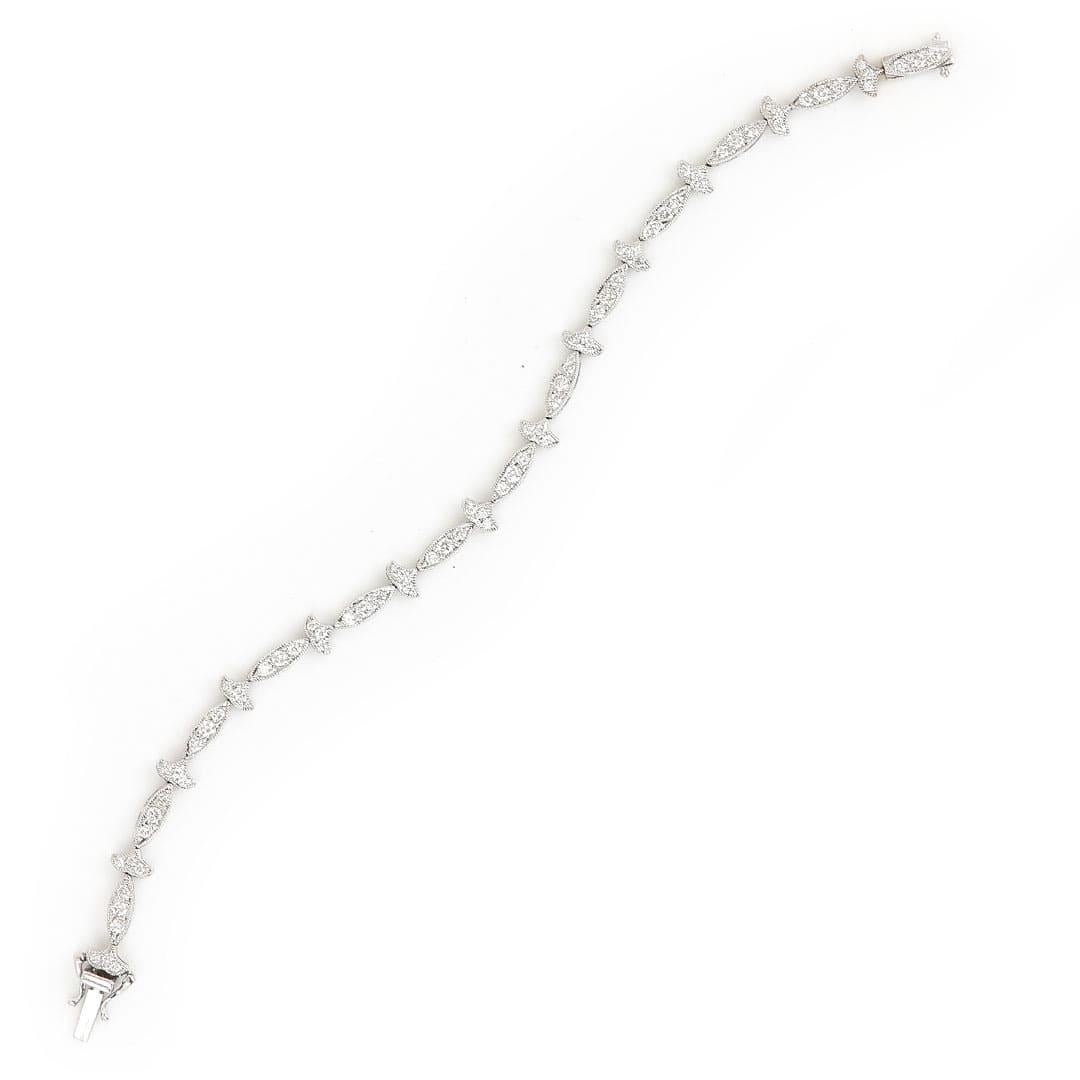 Brilliant Cut Contemporary 18ct White Gold 1.25ct Diamond Fleur De Lis Style Bracelet For Sale