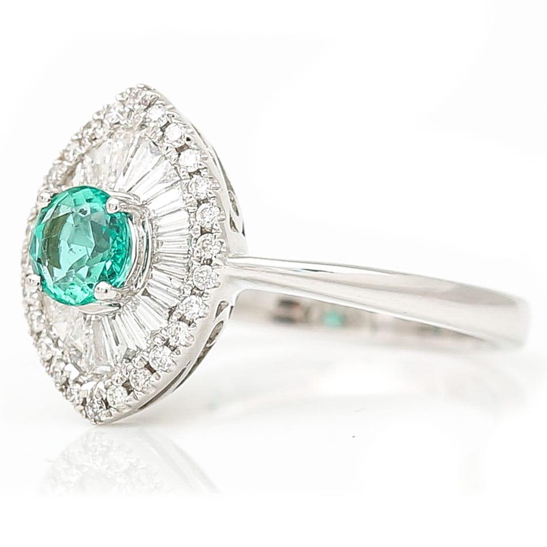 Round Cut Contemporary 18ct White Gold Emerald and Diamond Engagement Ring  For Sale