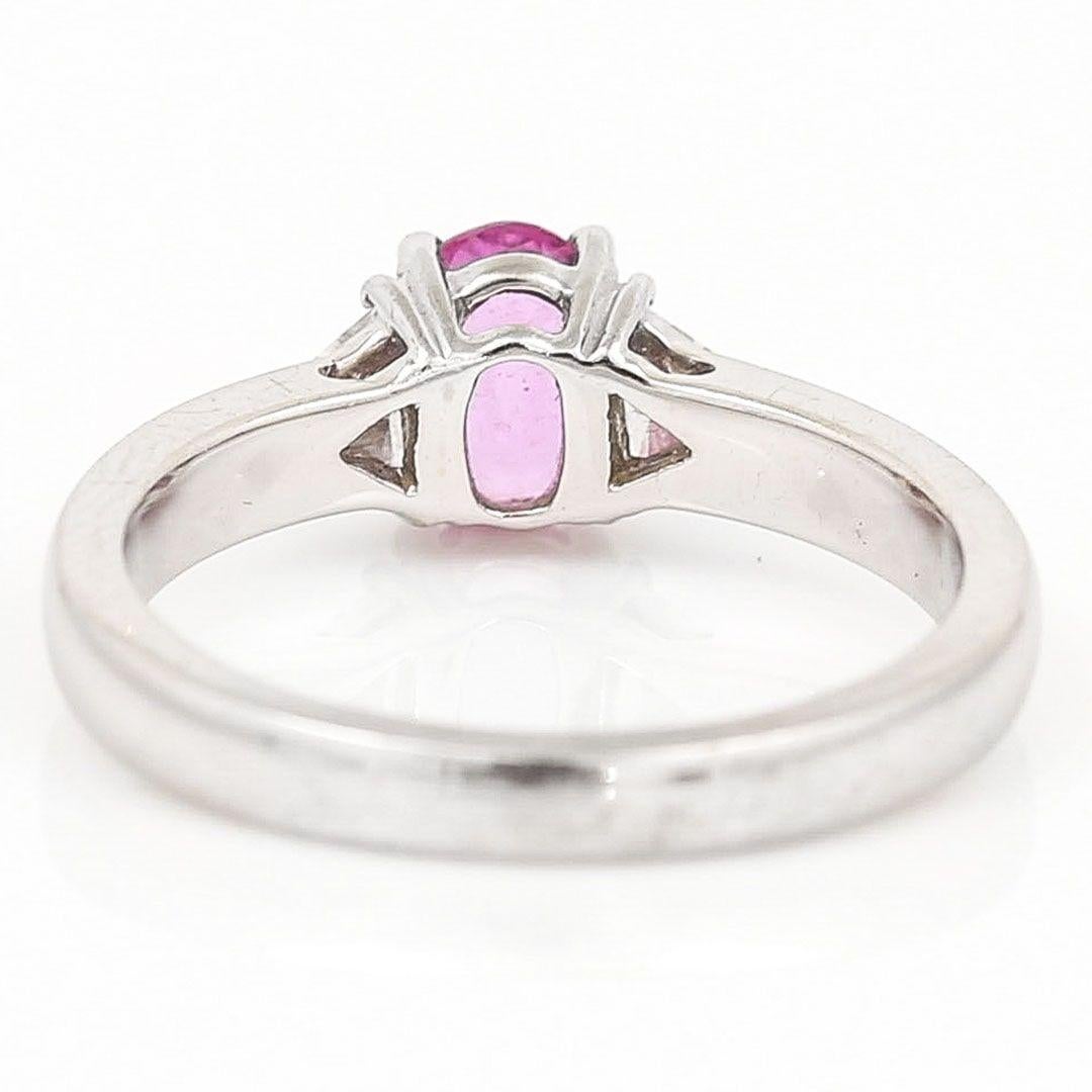 Contemporary 18ct White Gold Pink Sapphire and Trillion Cut Diamond Trilogy Ring For Sale 3