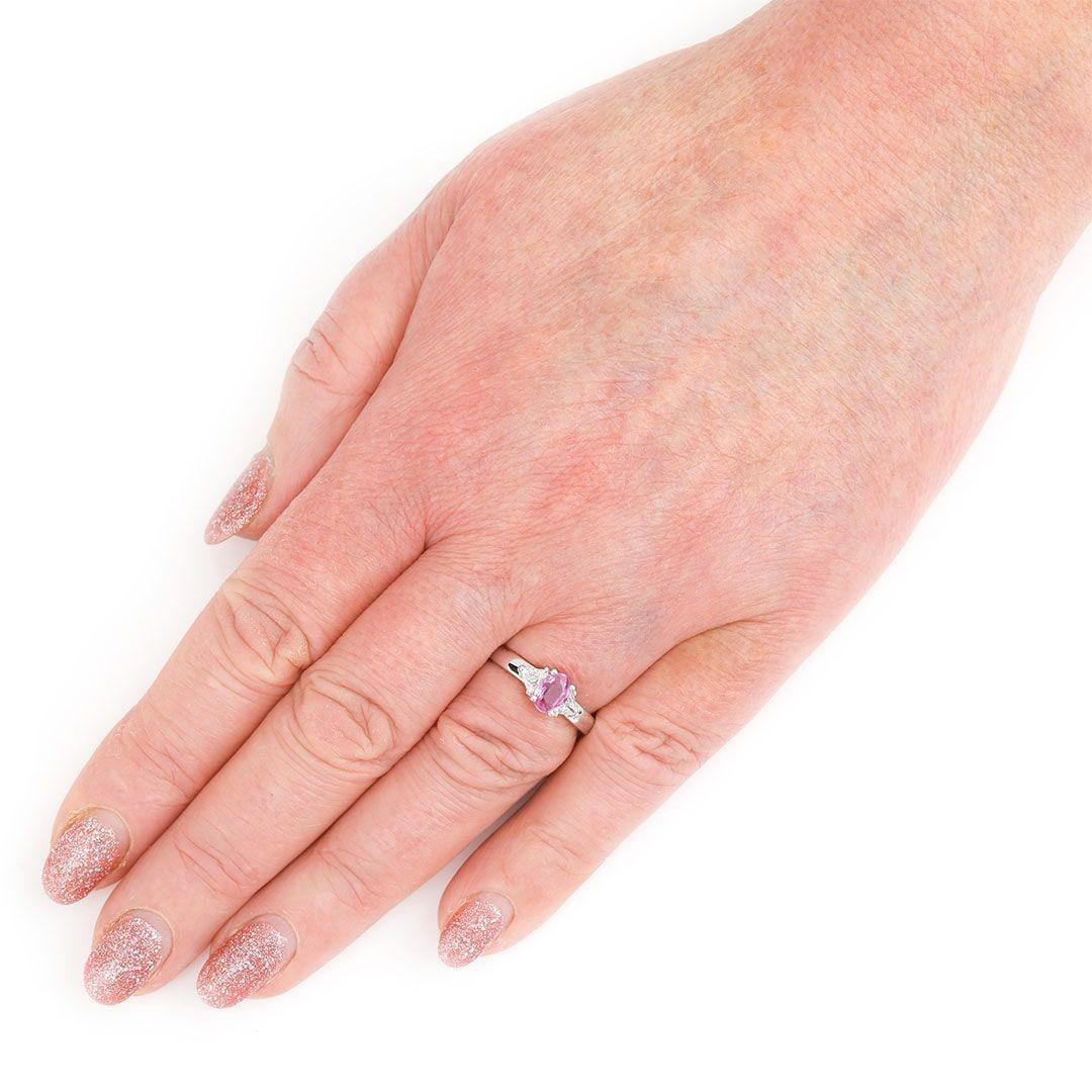 Contemporary 18ct White Gold Pink Sapphire and Trillion Cut Diamond Trilogy Ring For Sale 4