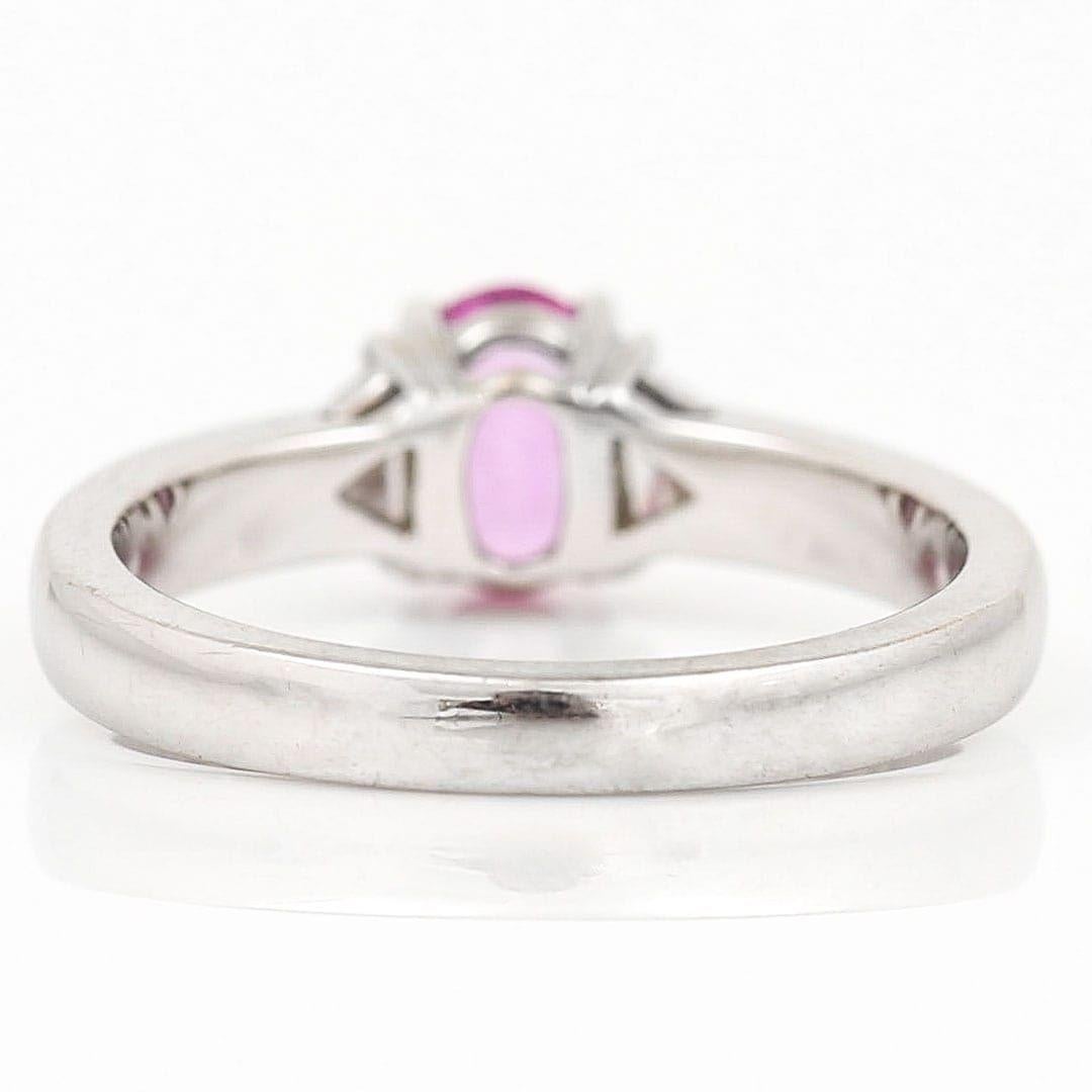 Contemporary 18ct White Gold Pink Sapphire and Trillion Cut Diamond Trilogy Ring For Sale 2