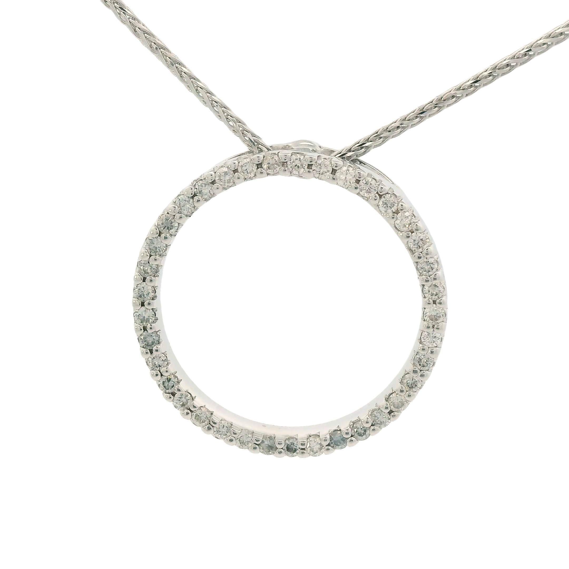 This necklace and pendant combination is spectacular! It features a contemporary Roberto Coin 18k white gold diamond circle pendant, as well as an 18