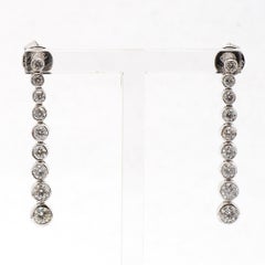 Contemporary 18 Karat White Gold Diamond Graduating Drop Earrings
