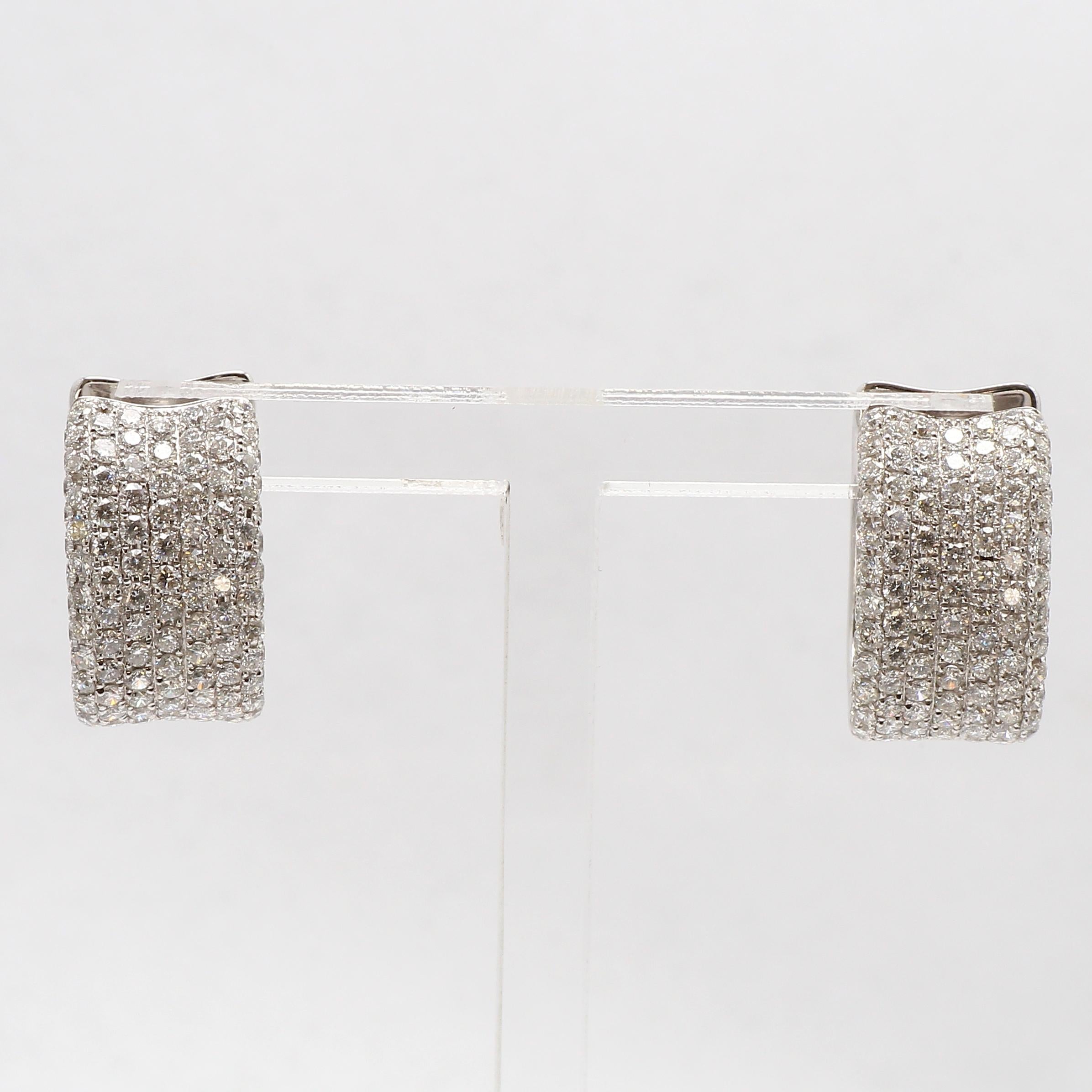 Elegantly handcrafted pair of Diamond Wrap Earrings.
Round Brilliant Cut White Diamonds totaling 2.64ct G-H Color, SI1-SI2 Clarity
Pave Set Diamond Designer Earrings.
