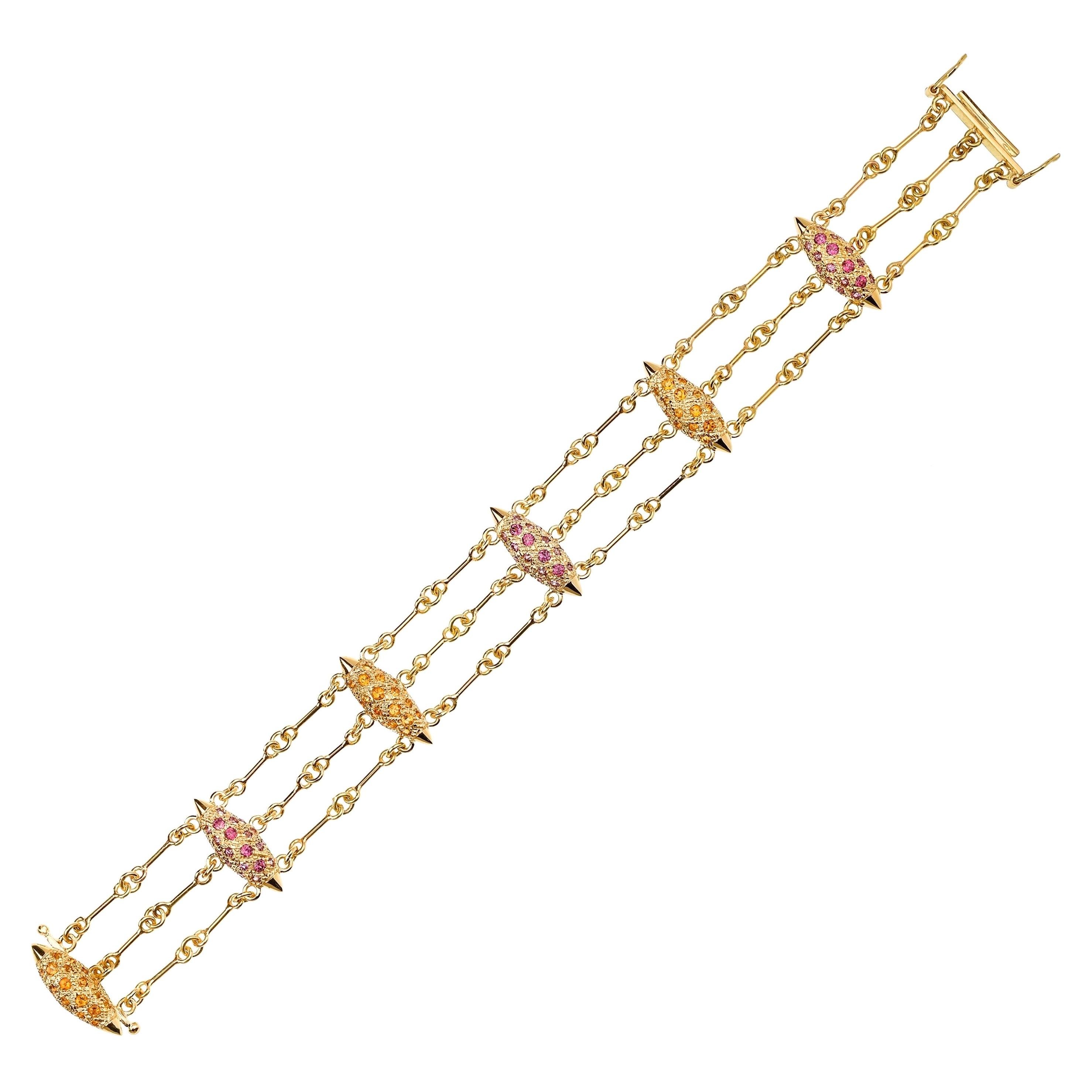 Contemporary 18K Yellow Gold Pink Garnet & Citrine Triple Chain Grain Bracelet For Sale
