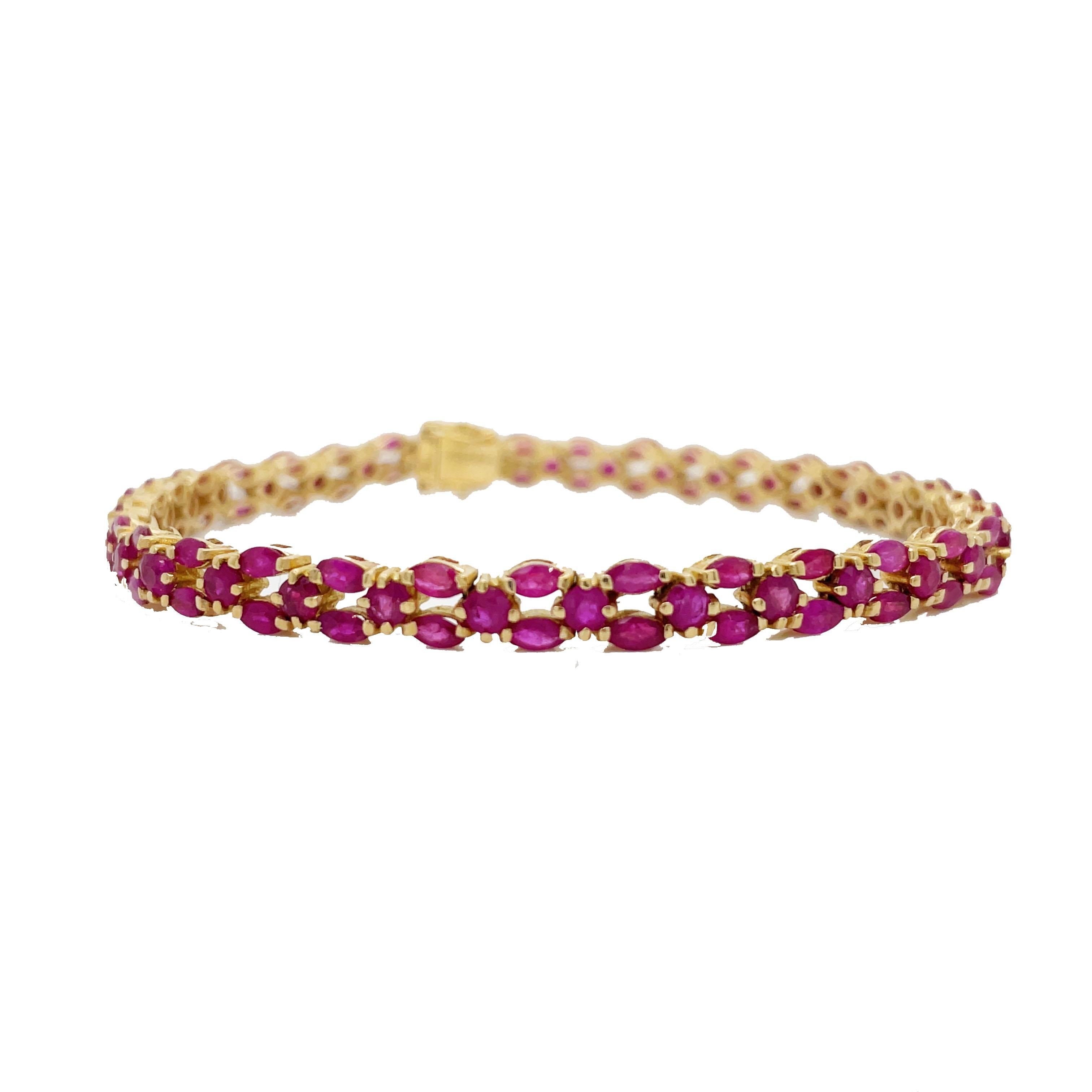 This is a lovely Contemporary tennis bracelet crafted in 18K Yellow gold adorned with bright and vibrant rubies! In this chic, refined, and gorgeous Contemporary jewel, a captivating array of bright rubies - set by yellow gold prongs - gleam from