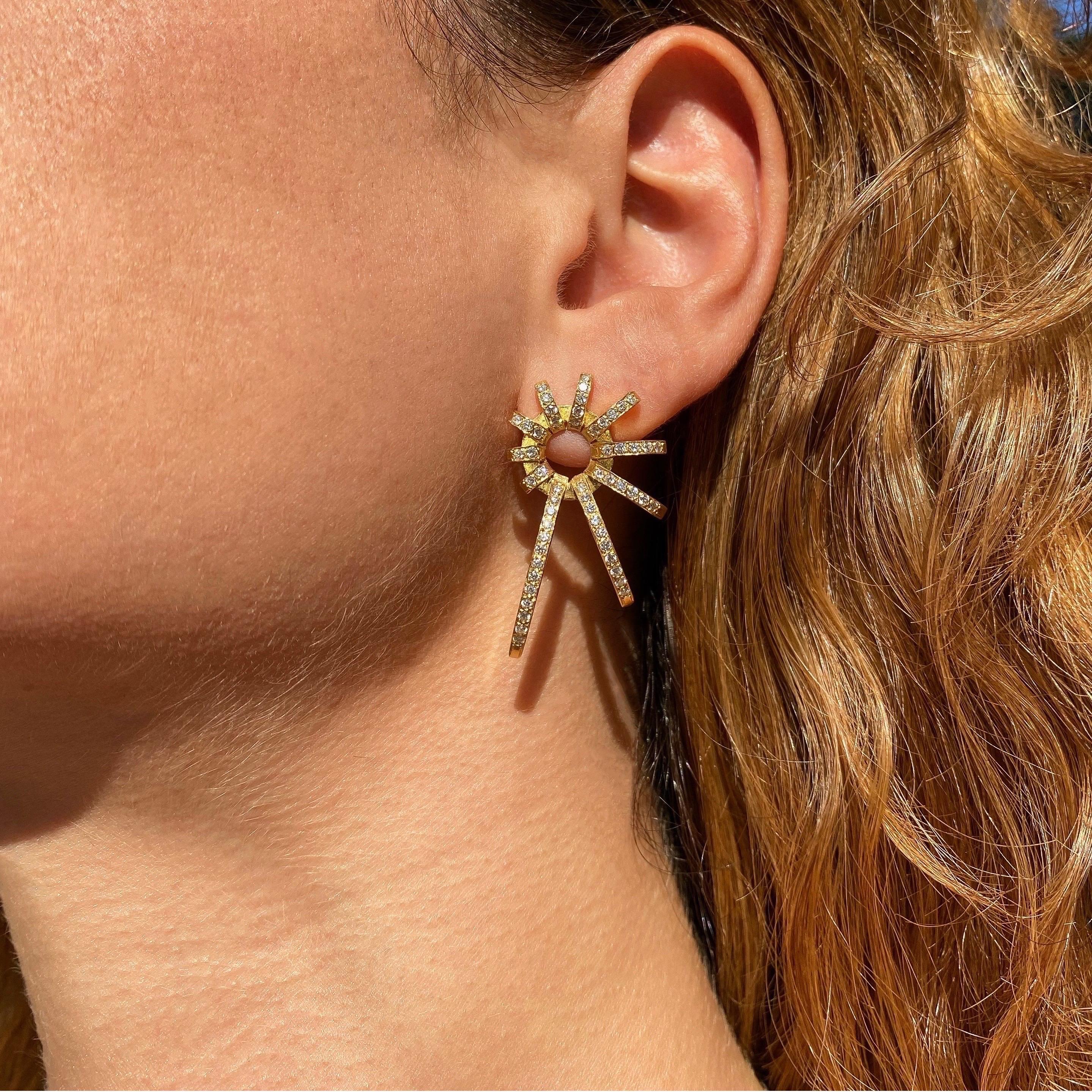 The 'Nautili’, earrings are crafted in 18k gold, hallmarked in Cyprus. This stunning pair of stud earrings, comes in a highly polished finish and features white, VS Diamonds, totalling 1,10 Cts. The 'Nautili’ earrings are part of Maria Kotsonis’s