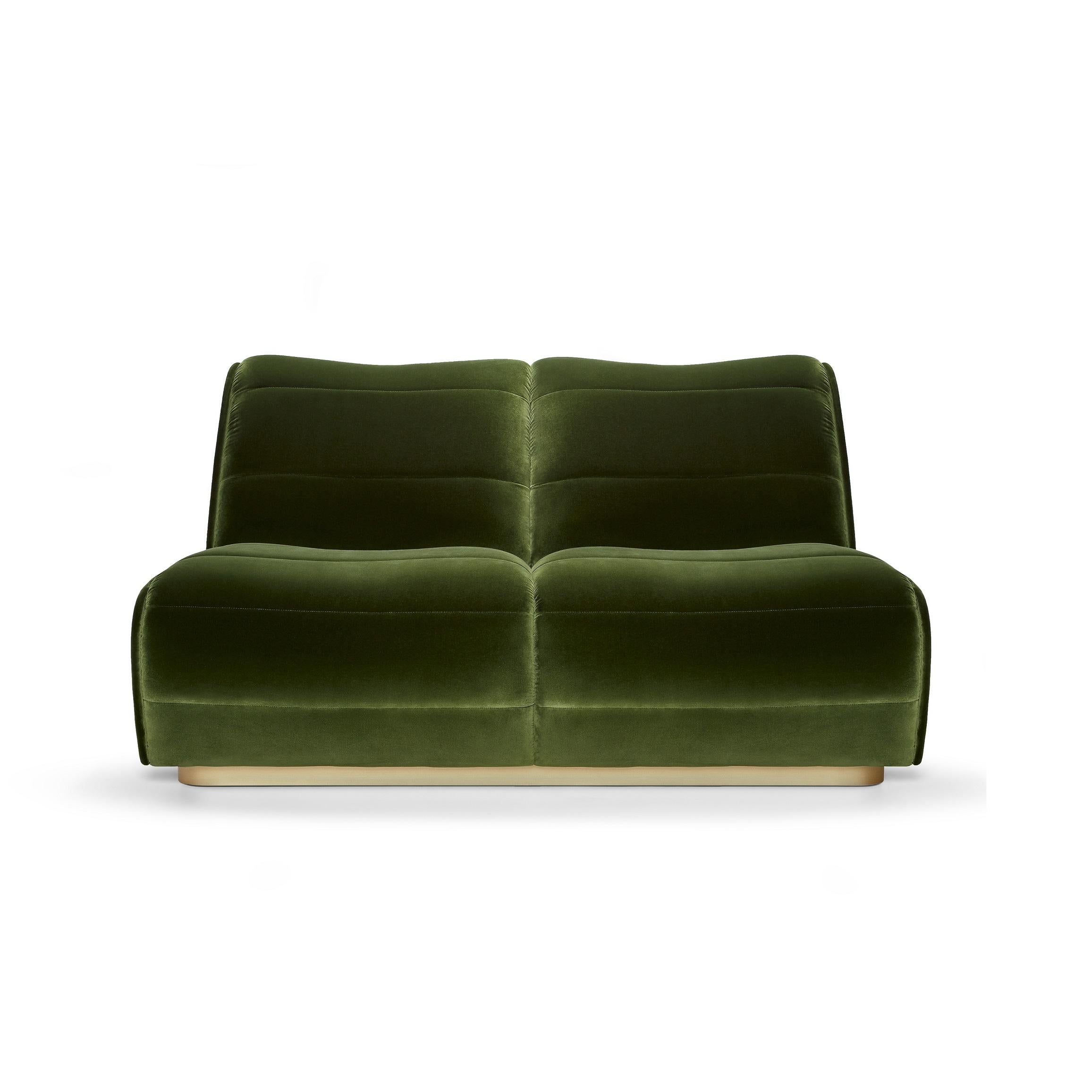  This sofa is an elevated homage to the golden age of gentleman drivers. The piece’s flawless structure is deceivingly simple, yet undeniably striking. The detailed upholstery and seaming bears the mark of true craftsmanship. Its sensuous lines are