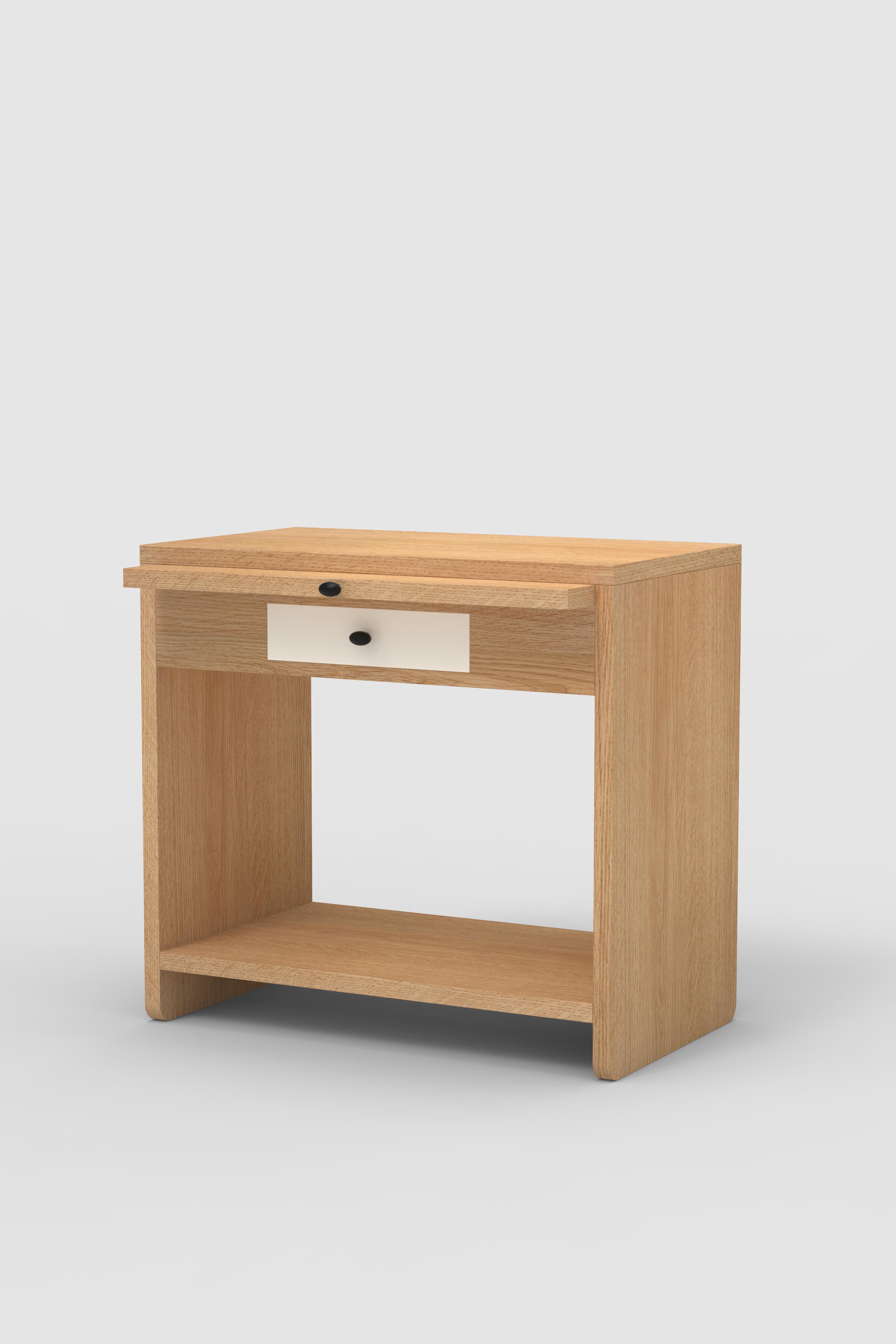 Orphan work 200 Bedside
Shown in oak.
Available in natural oak with white or off-white painted drawer front. 
Measures: 28” W x 16” D x 26” H
small drawer 12