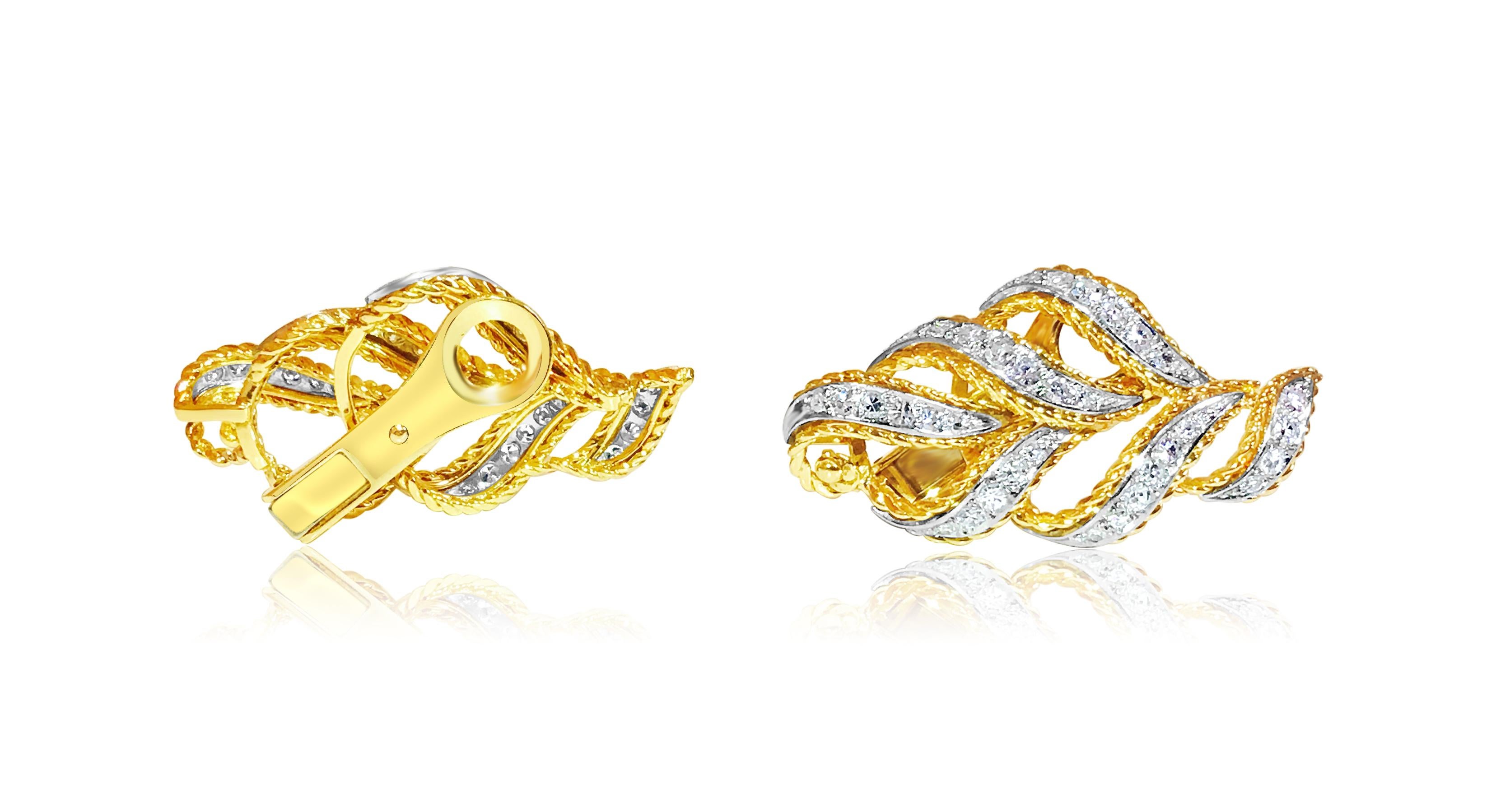 14K yellow gold. 

TCW of diamonds: 2.00 carats. Round Cut. VS clarity and G color. Clip on earrings. 

Gorgeous leaf motif. Superb luster in diamonds. Nice shine. 