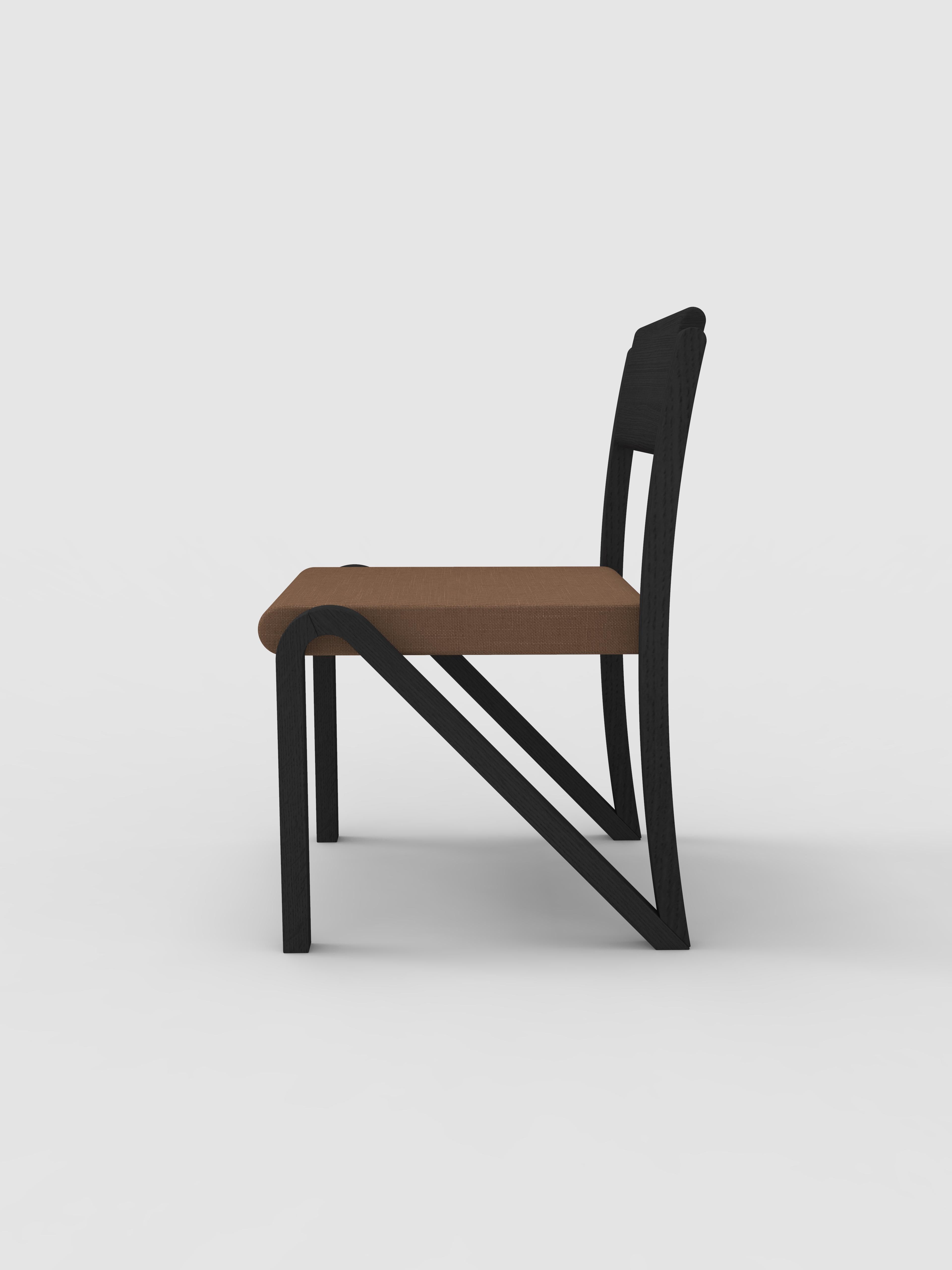 Orphan Work 200 side chair
Shown in blackened oak with upholstered seat 
Measures: 19 3/4” D x 17 1/2” W x 31” H
Available in natural oak or blackened oak

Orphan work is designed to complement in the heart of Soho, New York City. Each piece is