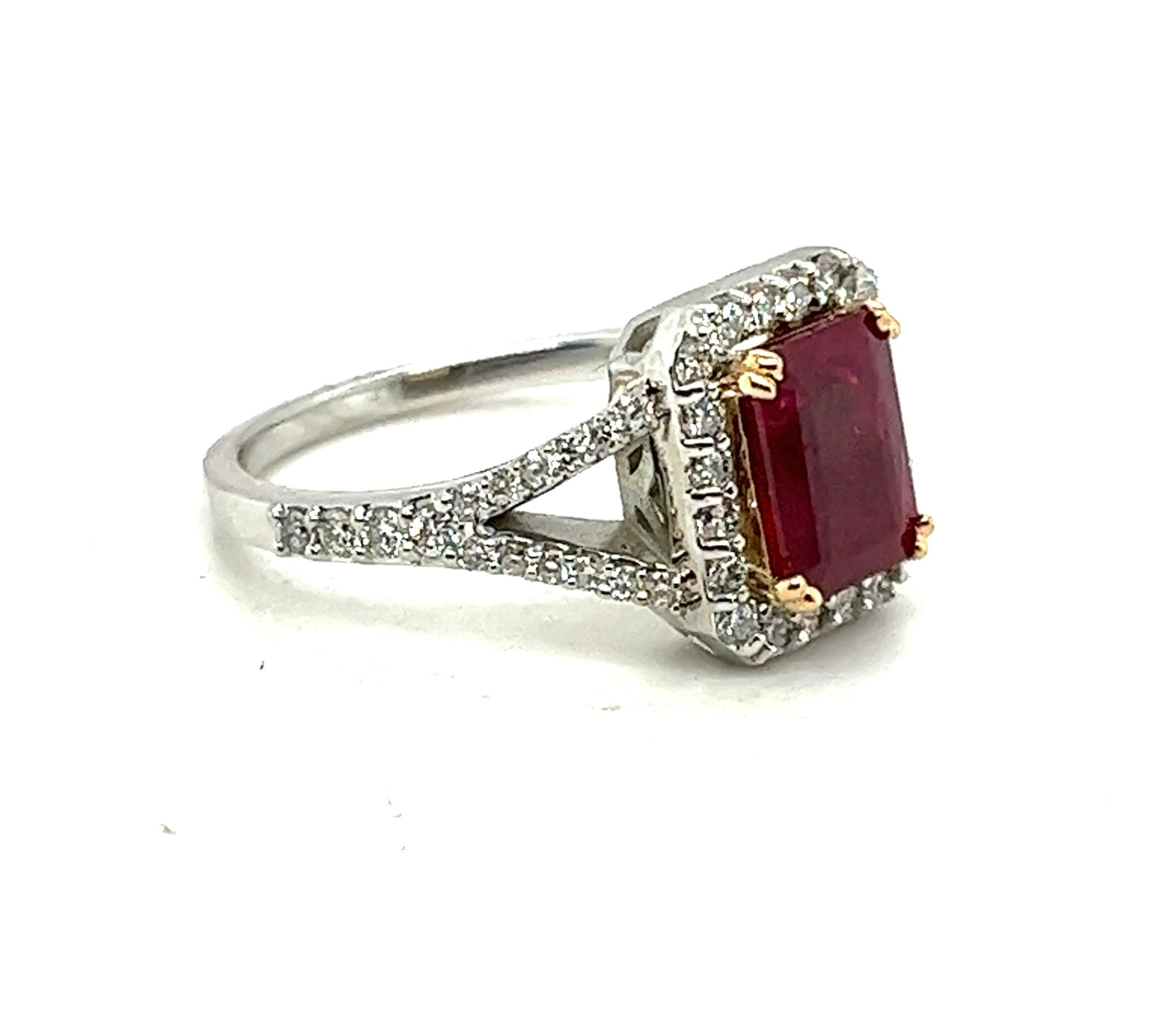  Enchanting 1.53 Carat Emerald Cut Red Ruby Engagement Ring

Capture the essence of love with this captivating engagement ring, featuring a mesmerizing 1.53 carat emerald cut red ruby as its centerpiece. Set within a stunning 18 karat yellow gold
