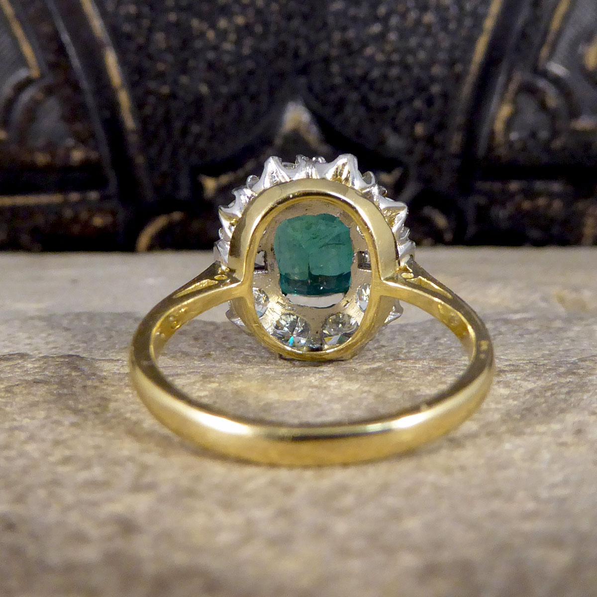 Round Cut Contemporary 2.08ct Emerald and 1.25ct Diamond Cluster Ring in 18ct Gold