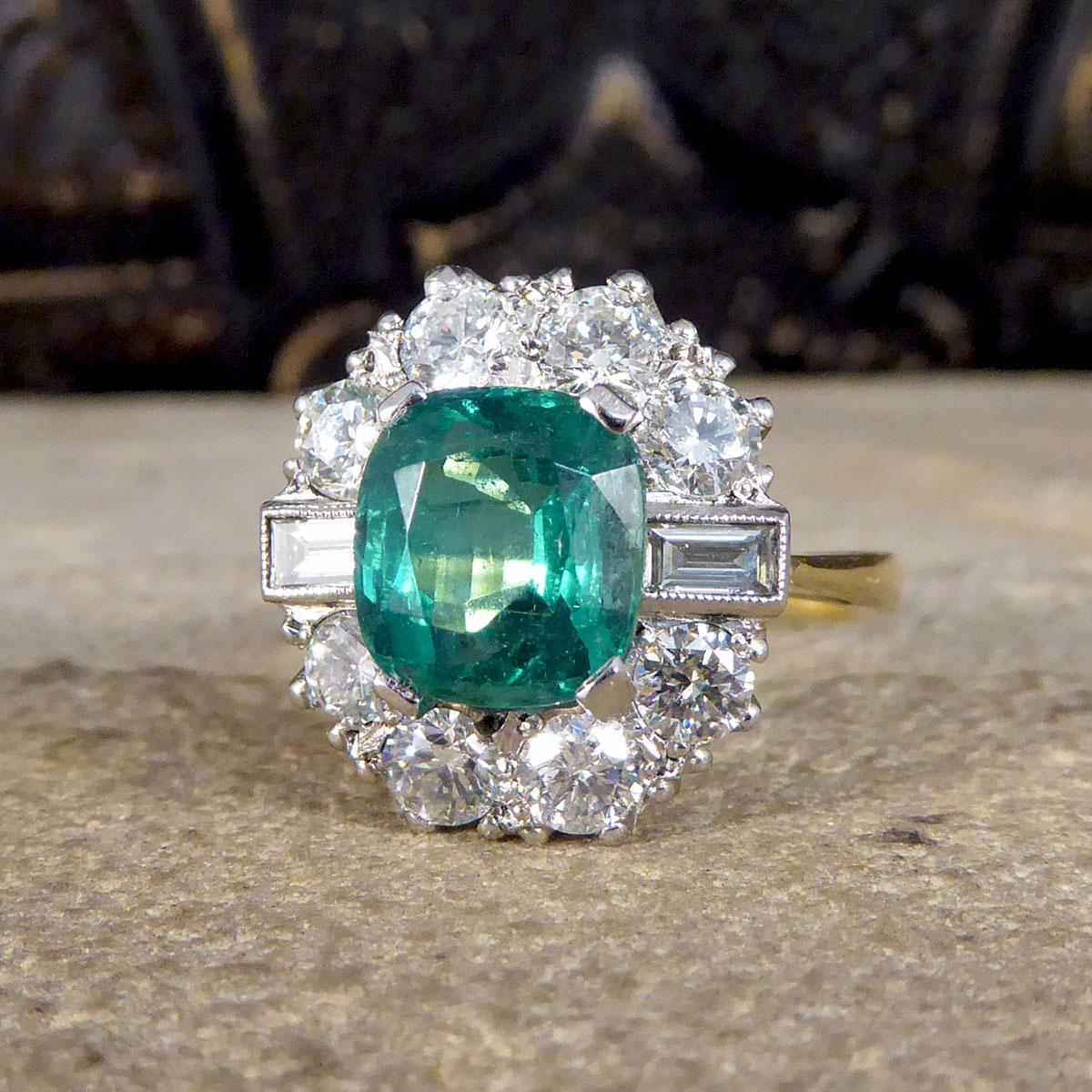Contemporary 2.08ct Emerald and 1.25ct Diamond Cluster Ring in 18ct Gold In Excellent Condition In Yorkshire, West Yorkshire