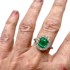 Contemporary 20th Century Diamond and Emerald  18K White Gold Ring