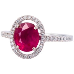 Contemporary 2.30ct Oval Ruby Diamond Halo Engagement Ring