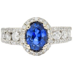Contemporary 2.31 Carat Sapphire Diamond 18 Karat White Gold Halo Ring