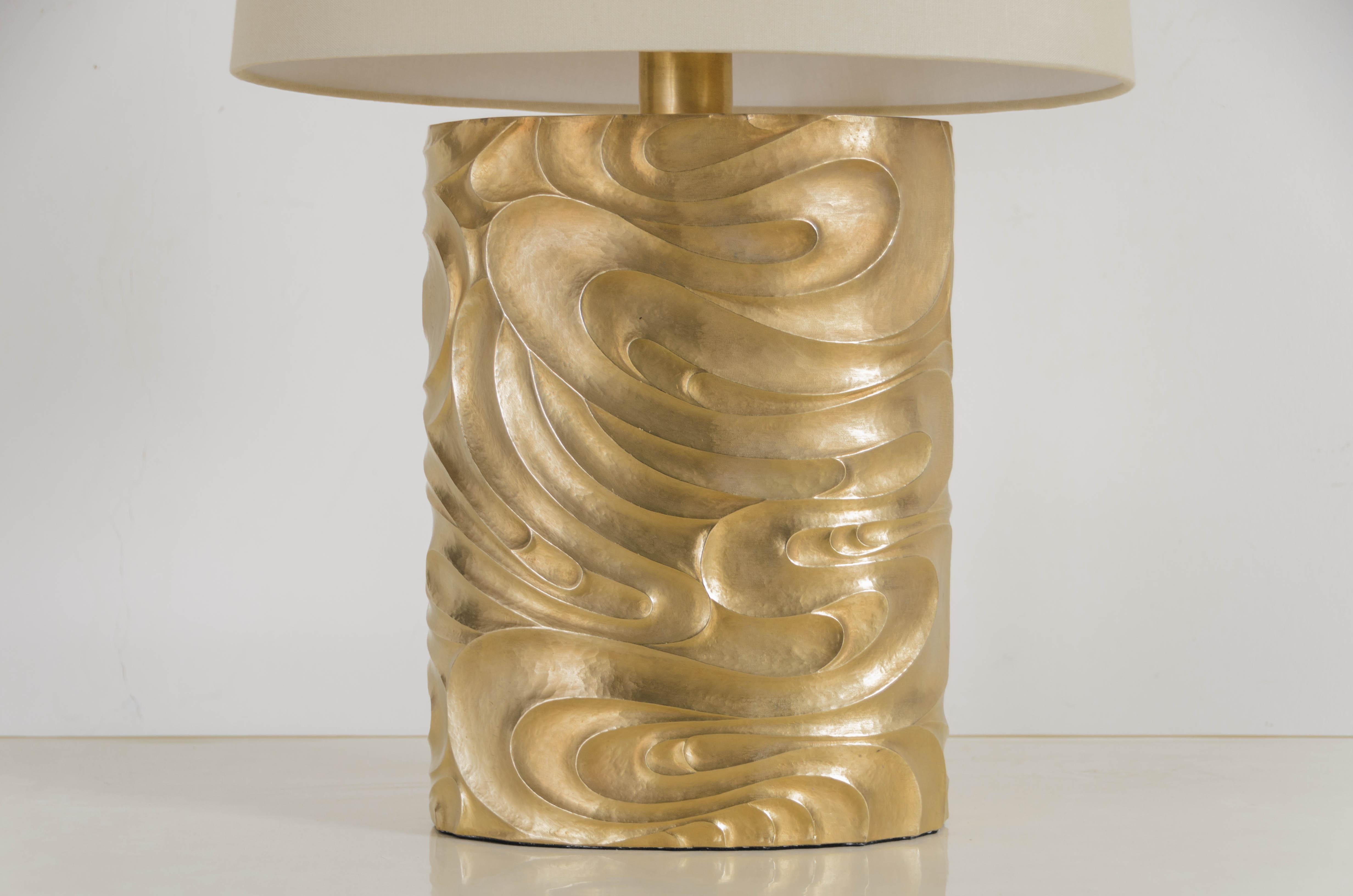 Oval Fei Tian Wen lamp
24K gold plated
Hand Repoussé
Copper base
Natural linen shade
Limited Edition
Each piece is individually crafted and is unique. 

Repoussé is the traditional art of hand-hammering decorative relief onto sheet metal.