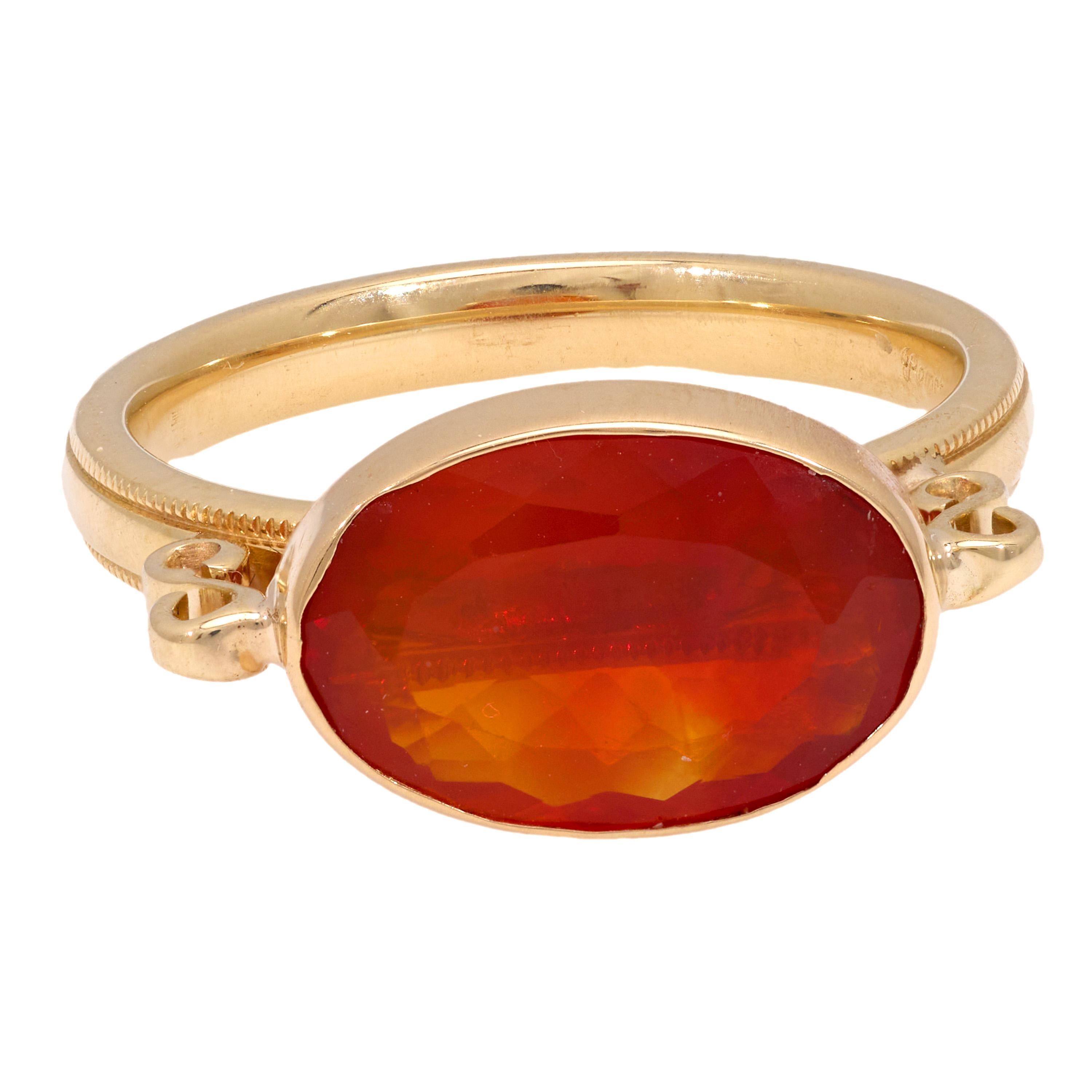 Oval Cut Contemporary 2.60 carat fire opal 14k yellow gold bezel ring For Sale