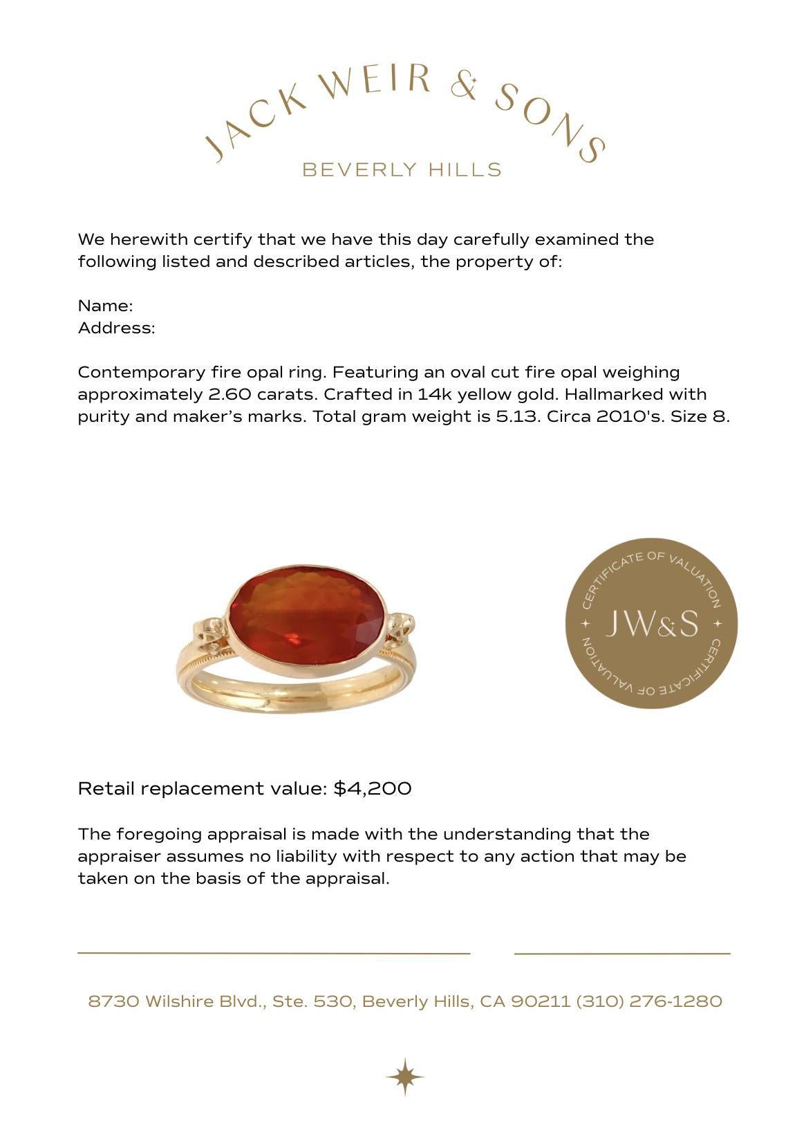 Contemporary 2.60 carat fire opal 14k yellow gold bezel ring For Sale 1