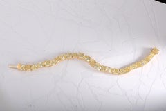Contemporary 26.06ct Fancy Yellow Diamond Tennis Bracelet in 18k Gold