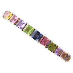 Bracciale contemporaneo in platino e zaffiro multicolore da 26,81 carati 2004