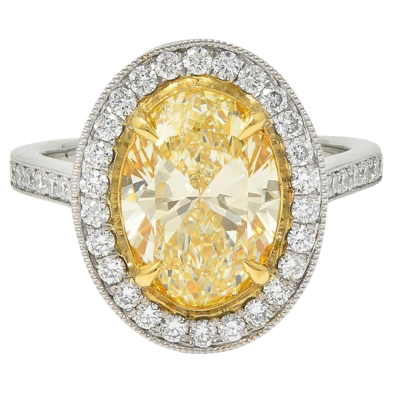 Contemporary 2.72 CTW Yellow Diamond Platinum 18 Karat Gold Halo Ring GIA For Sale