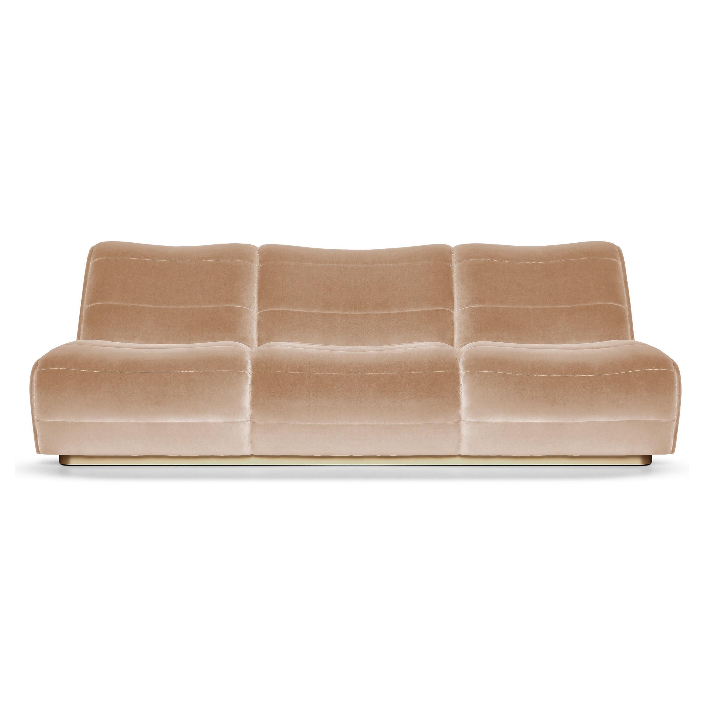 This sofa is an elevated homage to the golden age of gentleman drivers. The piece’s flawless structure is deceivingly simple, yet undeniably striking. The detailed upholstery and seaming bears the mark of true craftsmanship. Its sensuous lines are