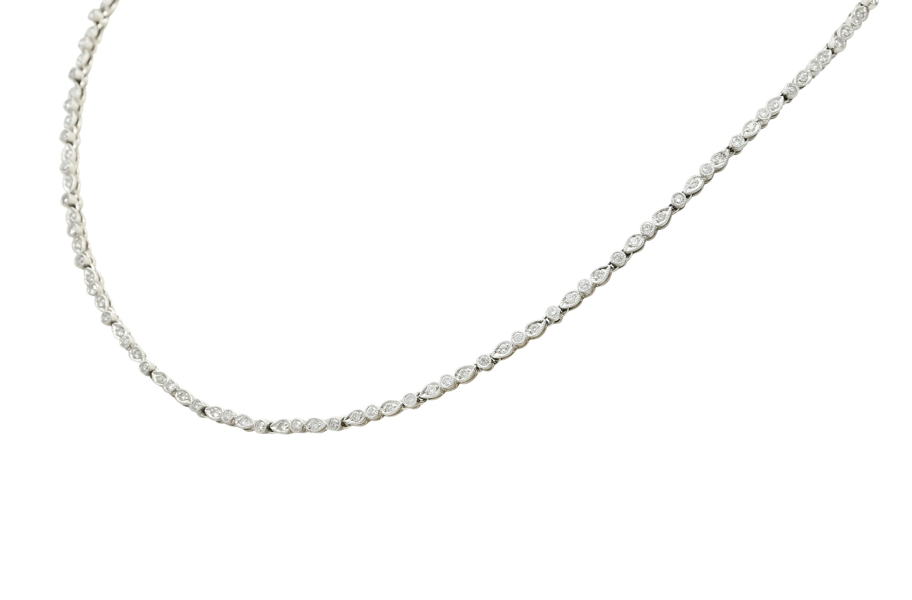 Necklace comprised of bezel set circular links alternating with bead set navette links

Set throughout with round brilliant cut diamonds, weighing approximately 3.05 carats total, G to I color and SI to I clarity

Completed by delicate millegrain