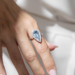 Contemporary 3.1 Carat Pear Cut Aquamarine & Diamond Halo Ring 18 Carat Gold