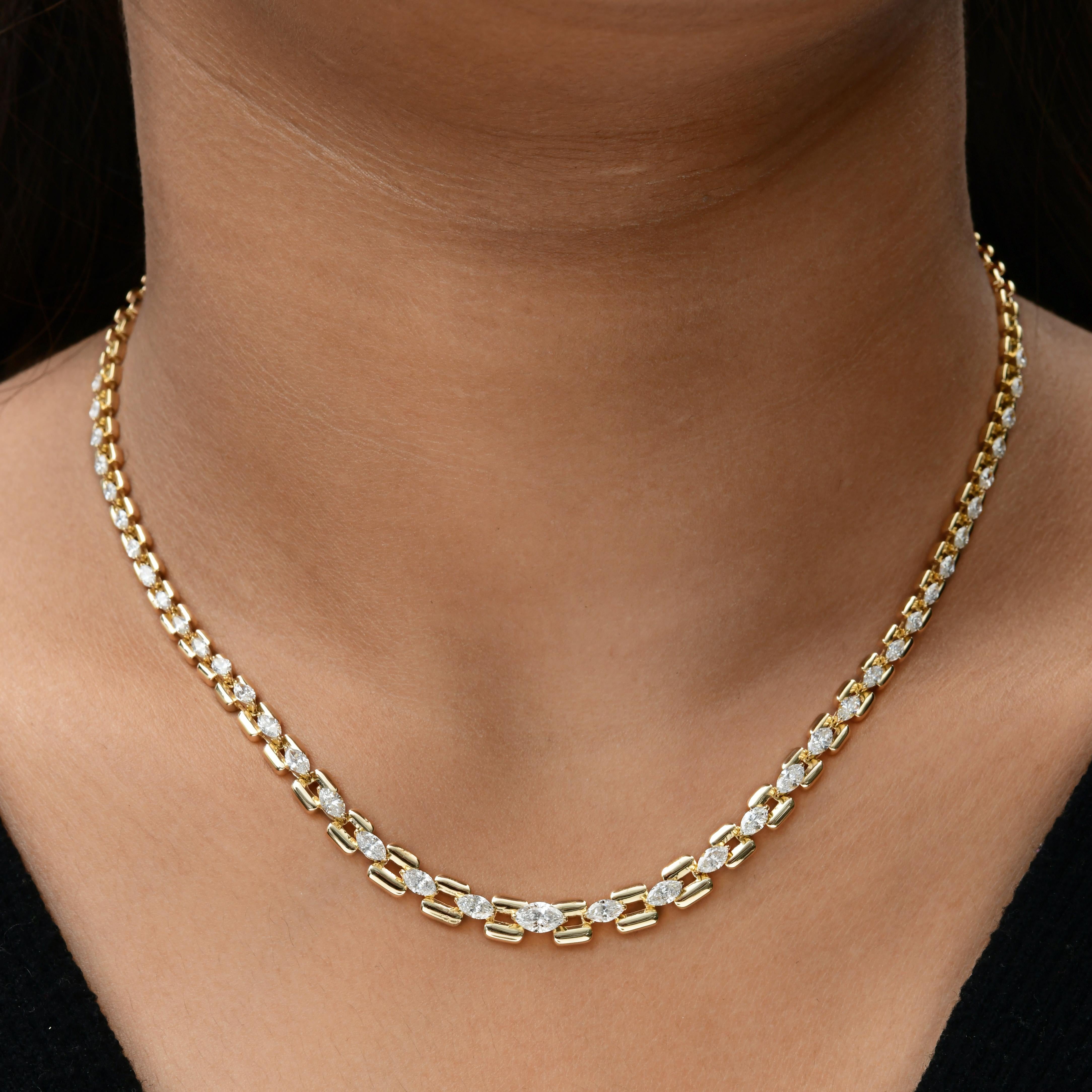 This 3.16Ct Marquise Diamond 18K Yellow Gold Link Chain Necklace features a sleek, symmetrical chain with alternating gold links and marquise cut diamonds. The geometric pattern adds a contemporary twist to a traditional gold chain