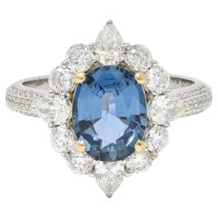 Contemporary 3.19 CTW No Heat Sapphire Diamond 18 Karat Two-Tone Gold Halo Ring