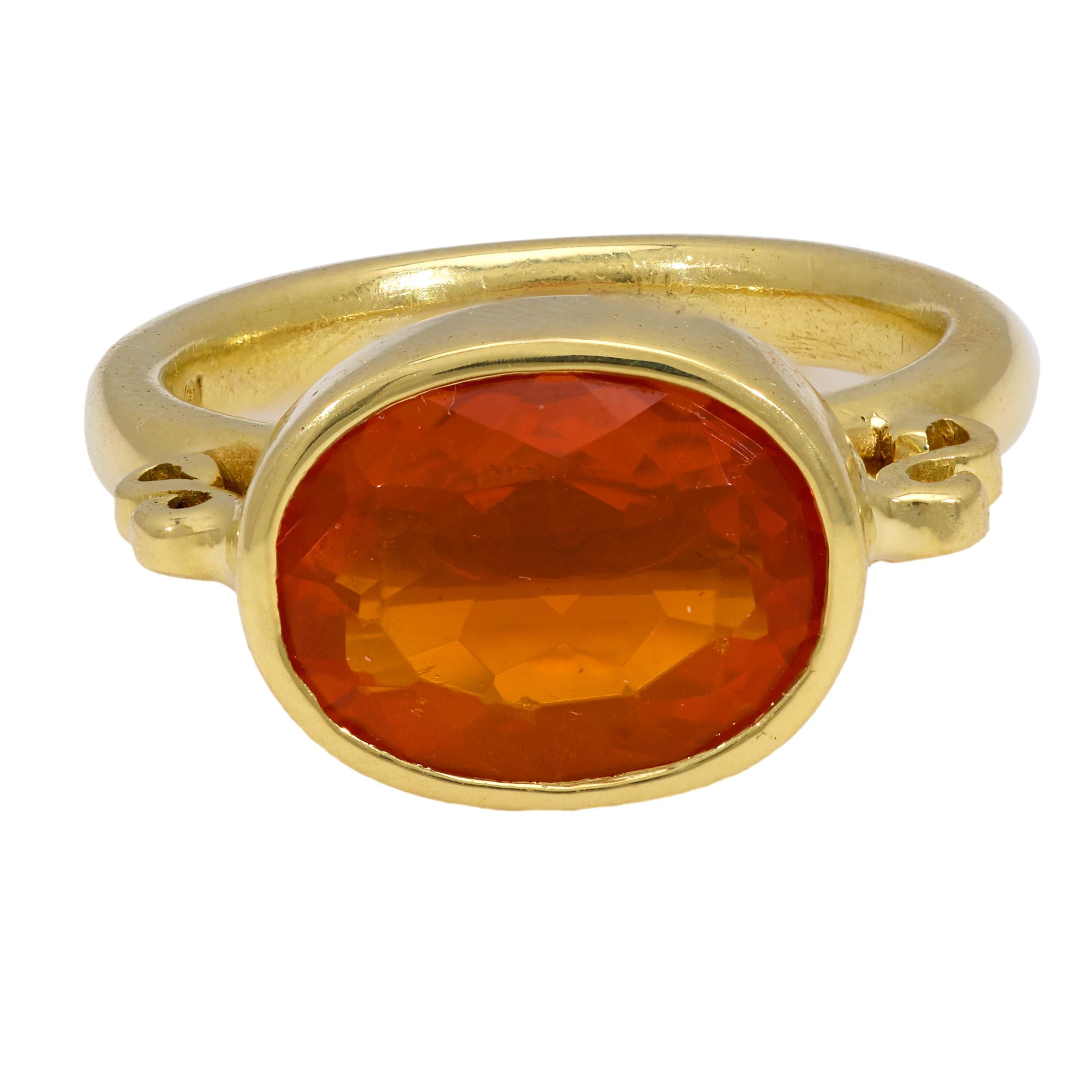 Oval Cut Contemporary 3.30 carat fire opal 18k yellow gold bezel ring For Sale