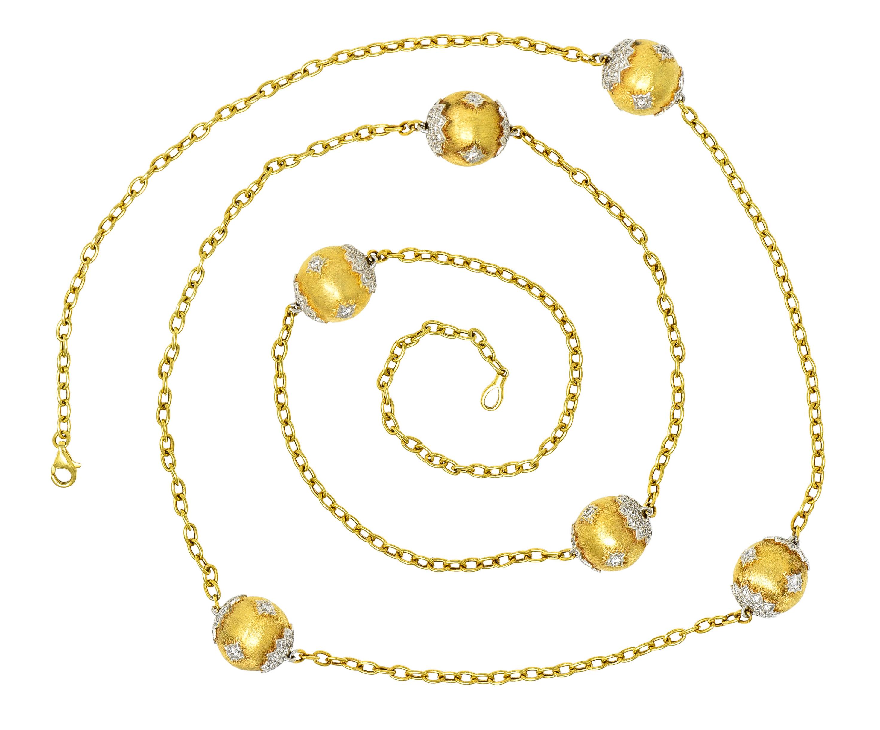 Designed as a cable chain with six sphere shaped stations with fine brushed gold linear texture. Featuring a platinum topped lace motif with round brilliant cut diamonds bead set throughout. Weighing approximately 3.60 carats total - G/H color with