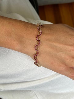 Contemporary 4.00tcw Synthetic Ruby 10k Yellow Gold Infinity Link Bracelet