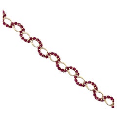 Contemporary 4.00tcw Synthetic Ruby 10k Yellow Gold Infinity Link Bracelet