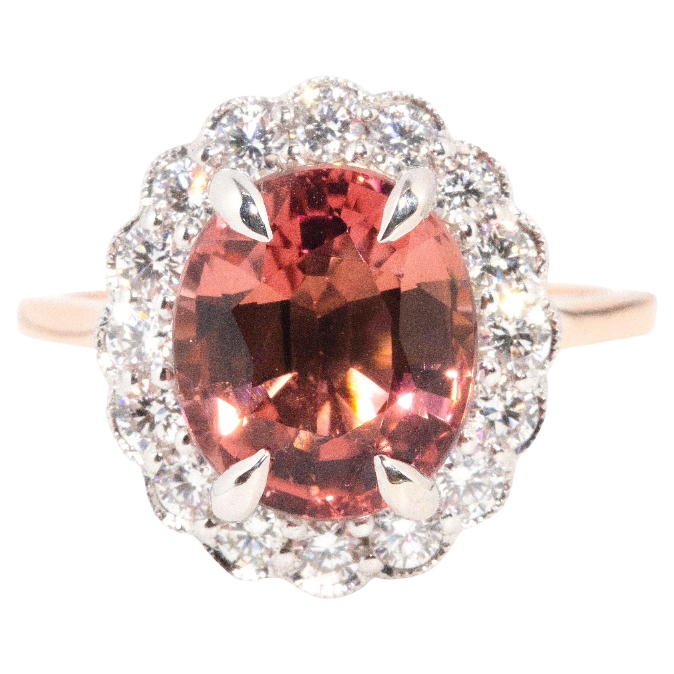 Contemporary 4.38 Carat Oval Orange Pink Tourmaline & Diamond 18 Carat Gold Ring For Sale