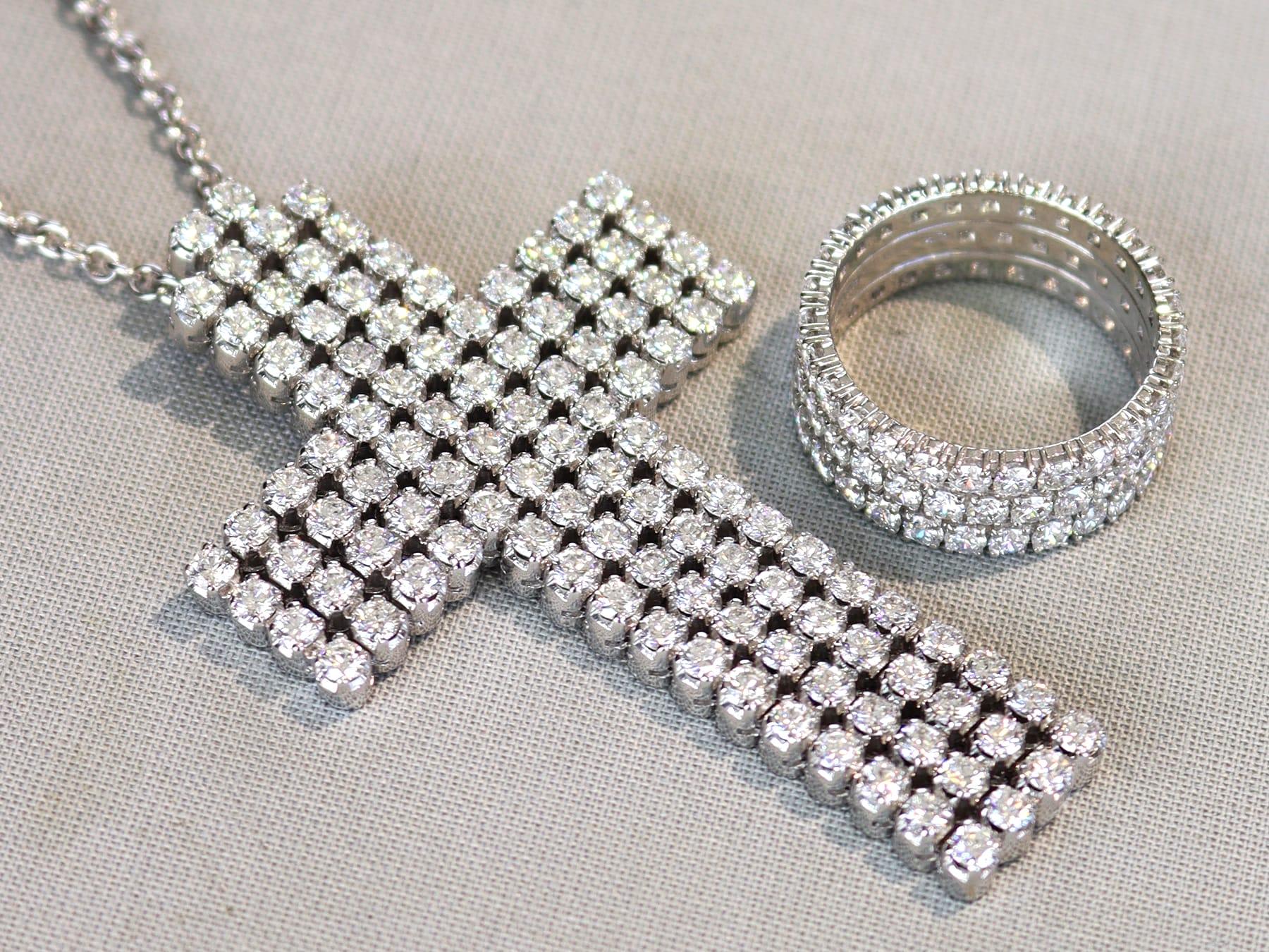 A stunning, fine and impressive contemporary 4.46 carat diamond and platinum triple row eternity ring; part of our diverse diamond eternity rings collections.

This fine and impressive diamond eternity ring has been crafted in platinum.

The full