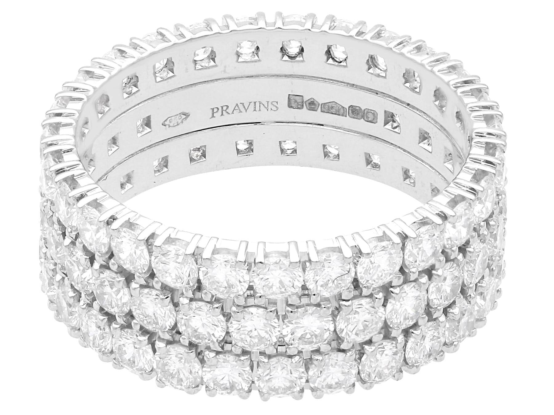Round Cut Contemporary 4.46Ct Diamond and Platinum Triple Row Eternity Ring 2013 For Sale