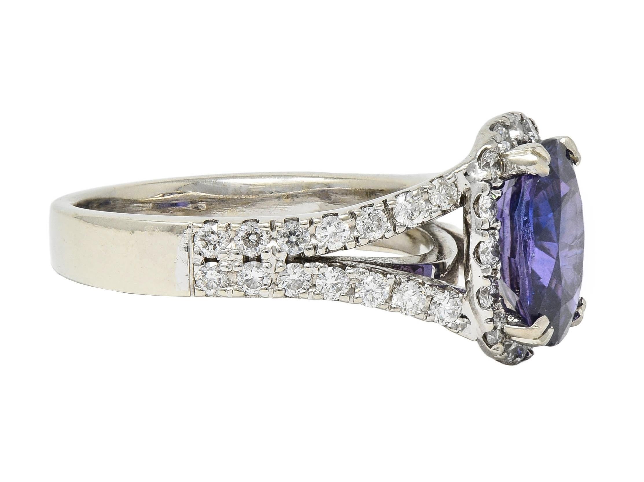Contemporary 4.60 CTW Color-Change Sapphire Diamond 14 Karat Gold Halo Ring GIA In Excellent Condition For Sale In Philadelphia, PA