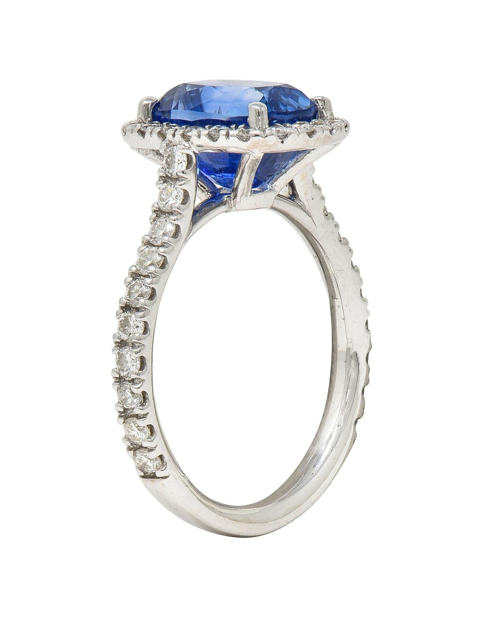 Contemporary 4.67 CTW Sapphire Diamond 18 Karat White Gold Halo Ring For Sale 5