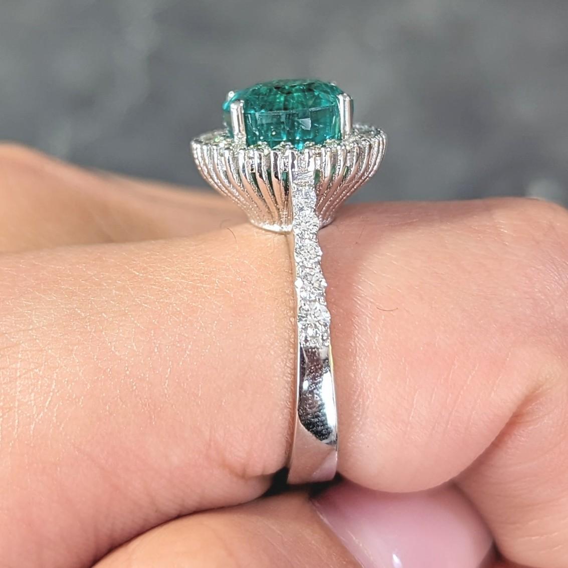 Contemporary 4.77 CTW Emerald Diamond 18 Karat Gold Halo Ring GIA For Sale 6