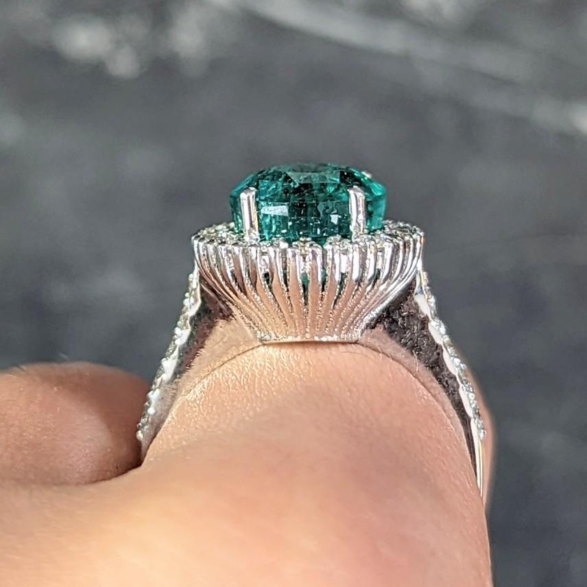 Contemporary 4.77 CTW Emerald Diamond 18 Karat Gold Halo Ring GIA For Sale 7