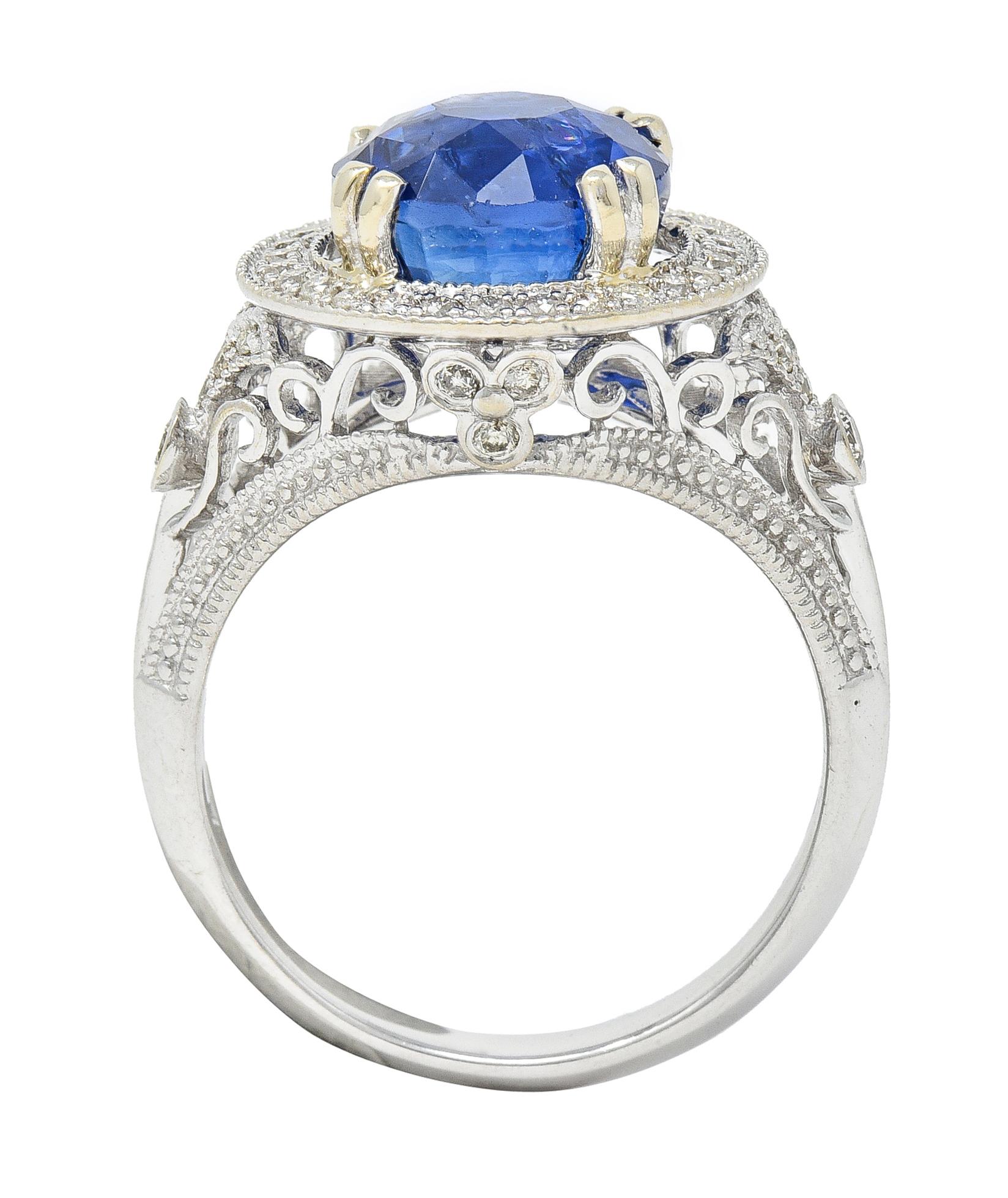 Contemporary 4.84 CTW Sapphire Diamond 14 Karat White Gold Halo Ring For Sale 6