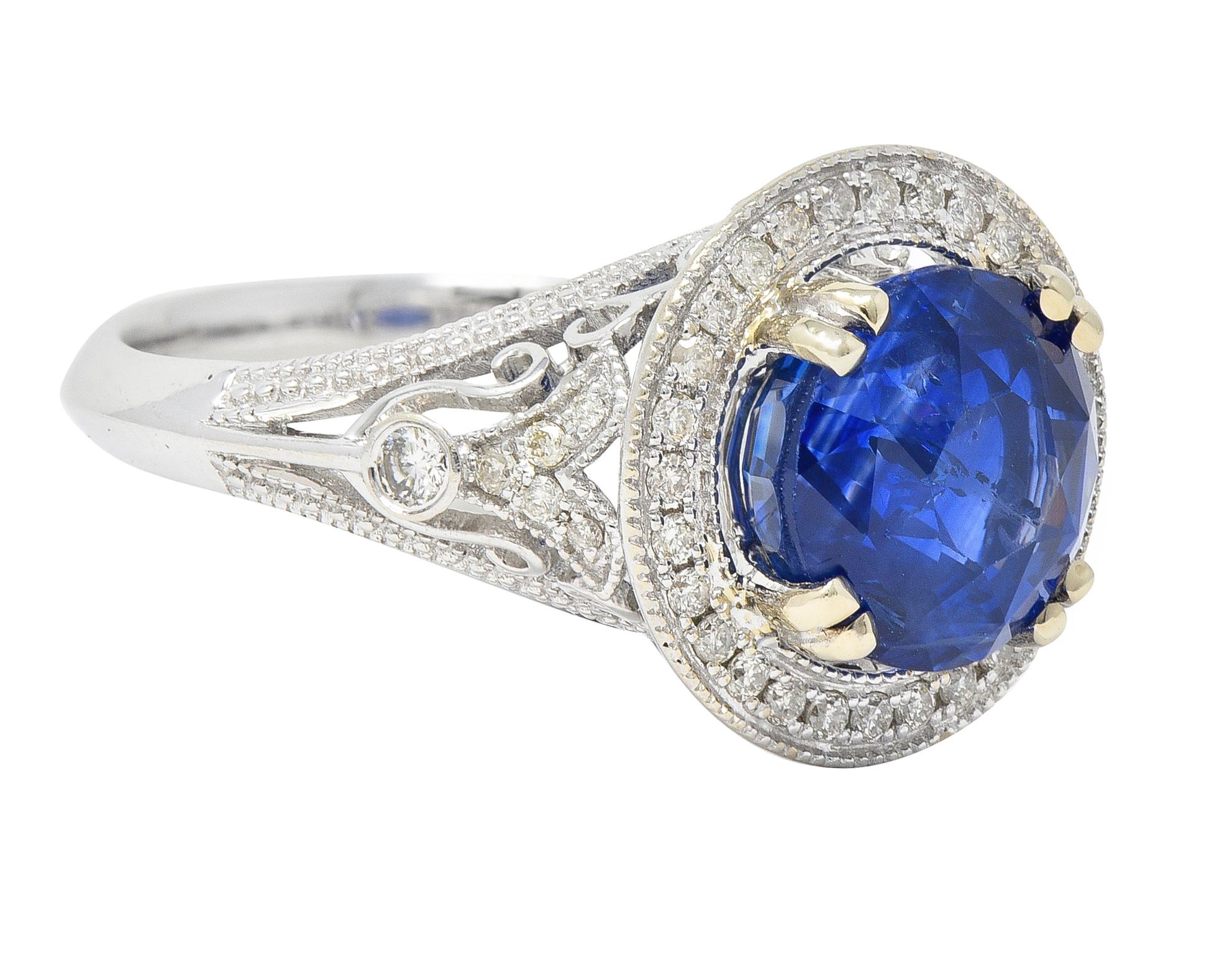 Round Cut Contemporary 4.84 CTW Sapphire Diamond 14 Karat White Gold Halo Ring For Sale