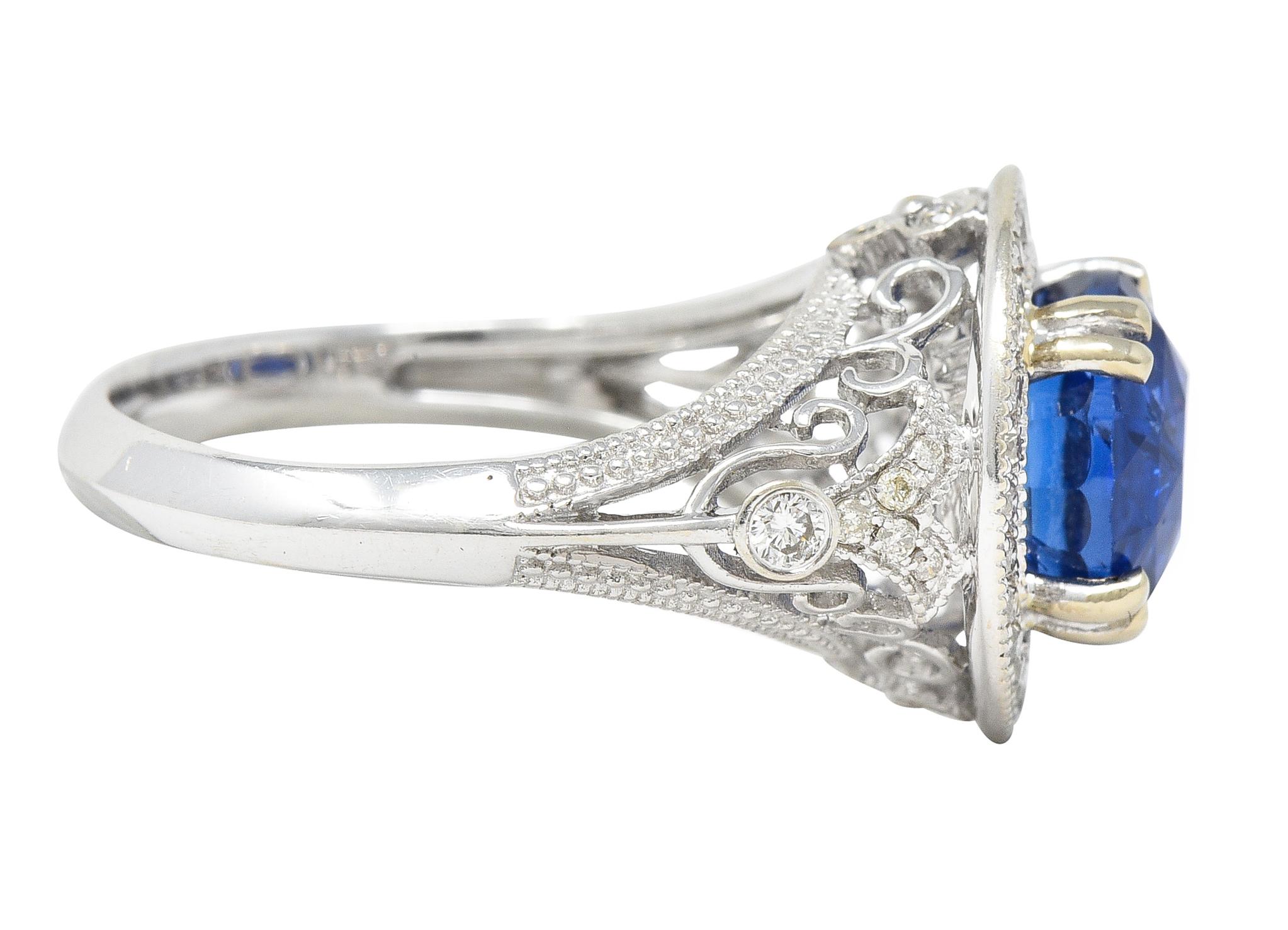 Contemporary 4.84 CTW Sapphire Diamond 14 Karat White Gold Halo Ring In Excellent Condition For Sale In Philadelphia, PA