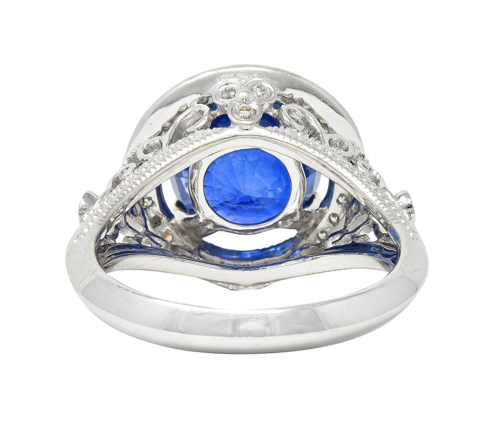 Women's or Men's Contemporary 4.84 CTW Sapphire Diamond 14 Karat White Gold Halo Ring For Sale