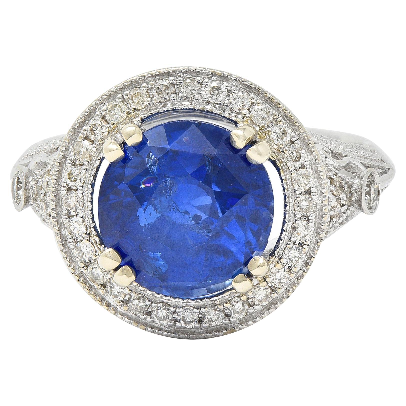 Contemporary 4.84 CTW Sapphire Diamond 14 Karat White Gold Halo Ring For Sale